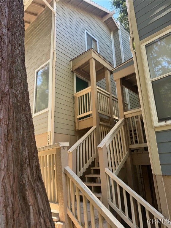 205 Cool Creek Lane Lake Arrowhead, CA 92352 - Photo 2 of 14 a view of staircase with large trees