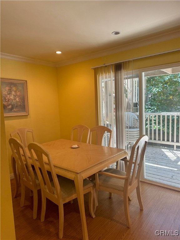 205 Cool Creek Lane Lake Arrowhead, CA 92352 - Photo 6 of 14 a view of a dining room with furniture and wooden floor