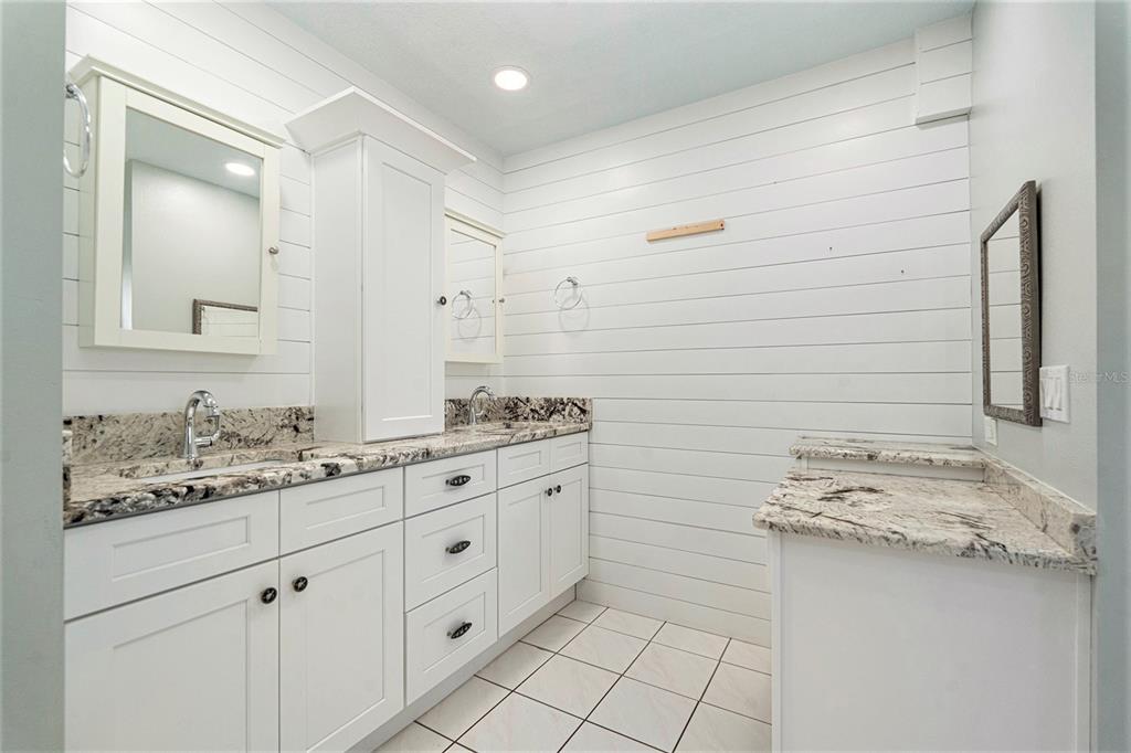 175 Pine Street Homosassa, FL 34446 - Photo 18 of 27 a bathroom with a sink and a mirror