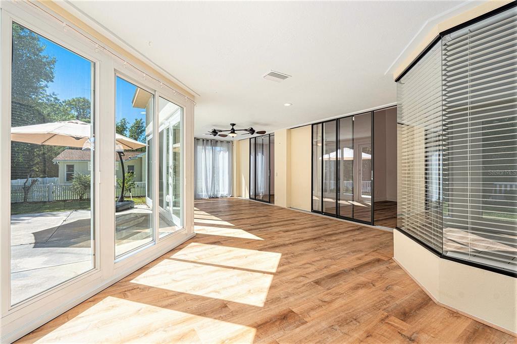 175 Pine Street Homosassa, FL 34446 - Photo 23 of 27 a spacious bedroom with a large window and a balcony