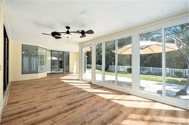 a view of an empty room with a balcony