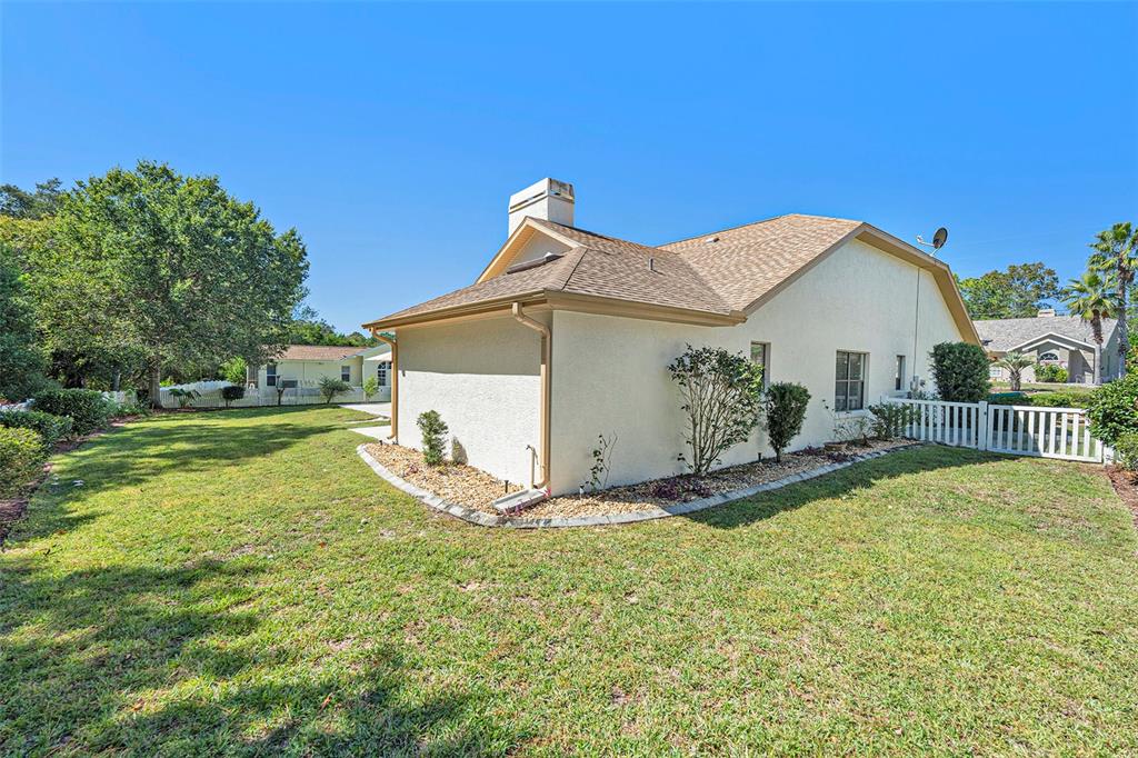 175 Pine Street Homosassa, FL 34446 - Photo 27 of 27 a view of a house with a yard