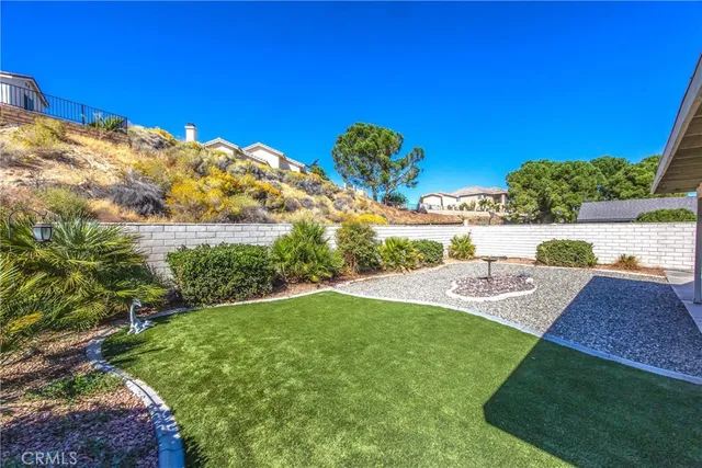 a view of yard with seating area