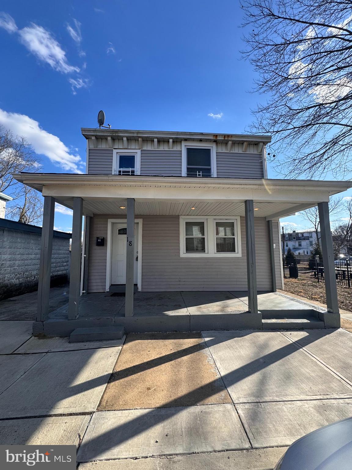 18 West Street Bordentown, NJ 08505 - Photo 1 of 12 a front view of a multi story building with yard