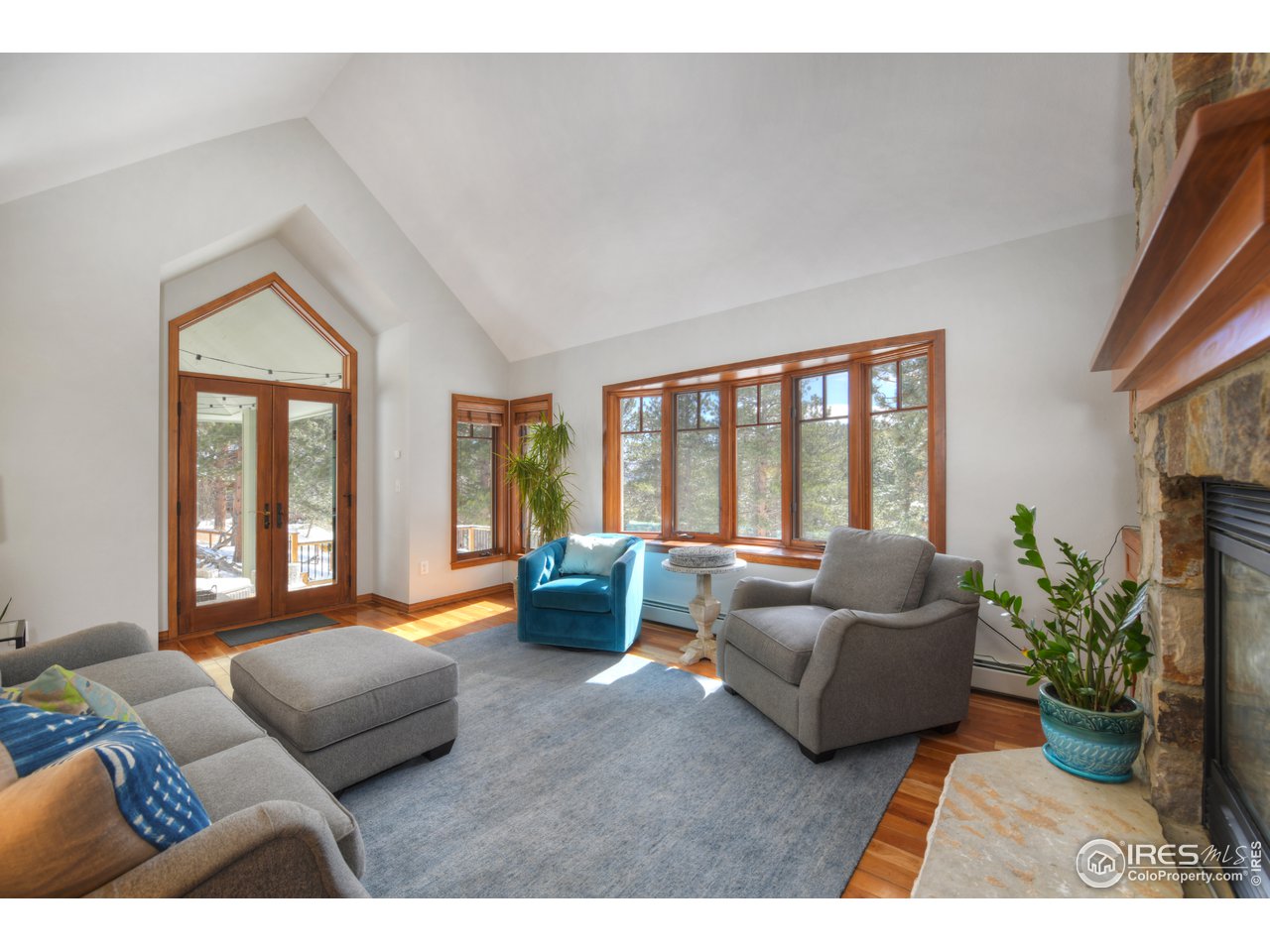 875 Primos Road Boulder, CO 80302 - Photo 4 of 40 Living opens to lovely patio with views of the foothills