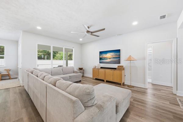 534 Southwest 145th Drive Newberry, FL 32669 - Photo 11 of 38 a living room with furniture and a window