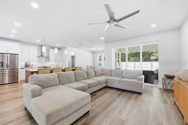 534 Southwest 145th Drive Newberry, FL 32669 - Photo 12 of 38 a living room with furniture and a large window