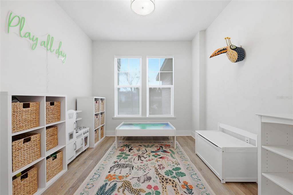 534 Southwest 145th Drive Newberry, FL 32669 - Photo 14 of 38 a hallway with closet and wooden floor