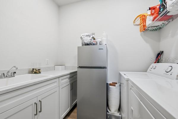 534 Southwest 145th Drive Newberry, FL 32669 - Photo 26 of 38 a utility room with dryer and washer