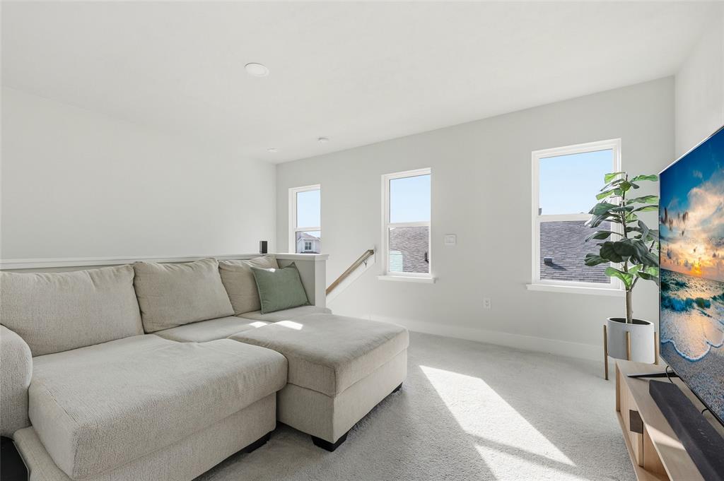 534 Southwest 145th Drive Newberry, FL 32669 - Photo 28 of 38 a living room with furniture a fireplace and a potted plant