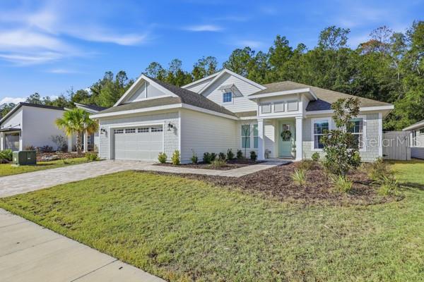 534 Southwest 145th Drive Newberry, FL 32669 - Photo 36 of 38 front view of a house with a yard