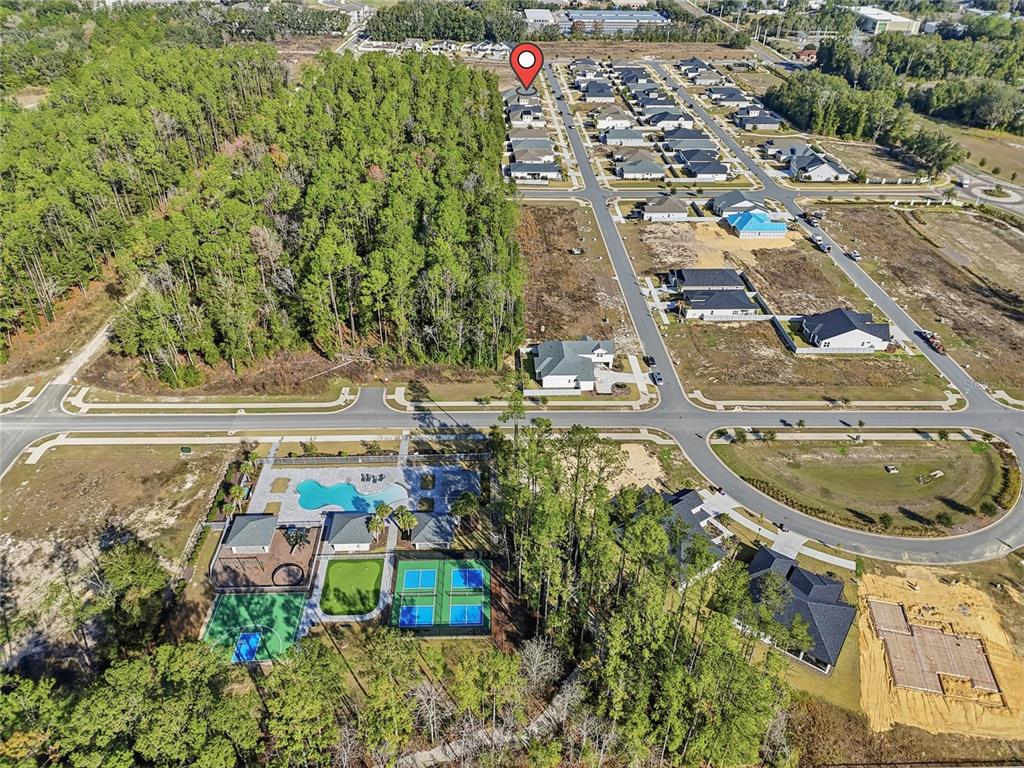 534 Southwest 145th Drive Newberry, FL 32669 - Photo 38 of 38 an aerial view of a house with a yard and lake view