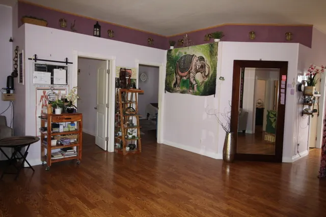a view of livingroom with furniture and wooden floor