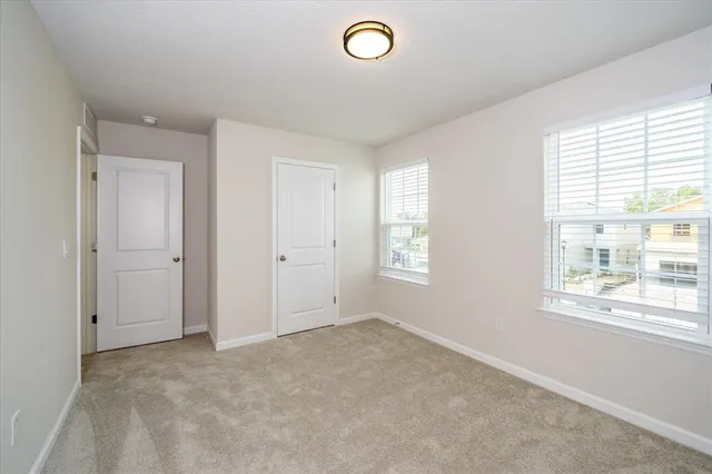 a view of hallway with a window