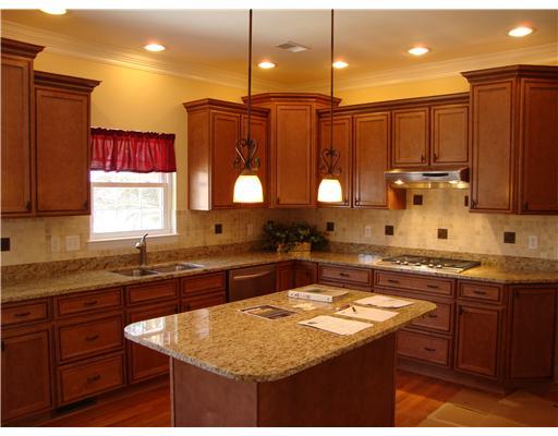 Lot 206 Field Club Ridge Road Pittsburgh, PA 15238 - Photo 14 of 16 Kitchen. Sample of a standard kitchen. Glazed cabinetry with granite and SS appliances are standard. Large island and built-in ovens/cooktop,photo is not showing the morningroom