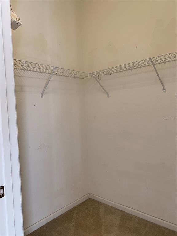 13500 Turtle Marsh Loop, Unit 837 Orlando, FL 32837 - Photo 18 of 30 a view of an empty walk in closet