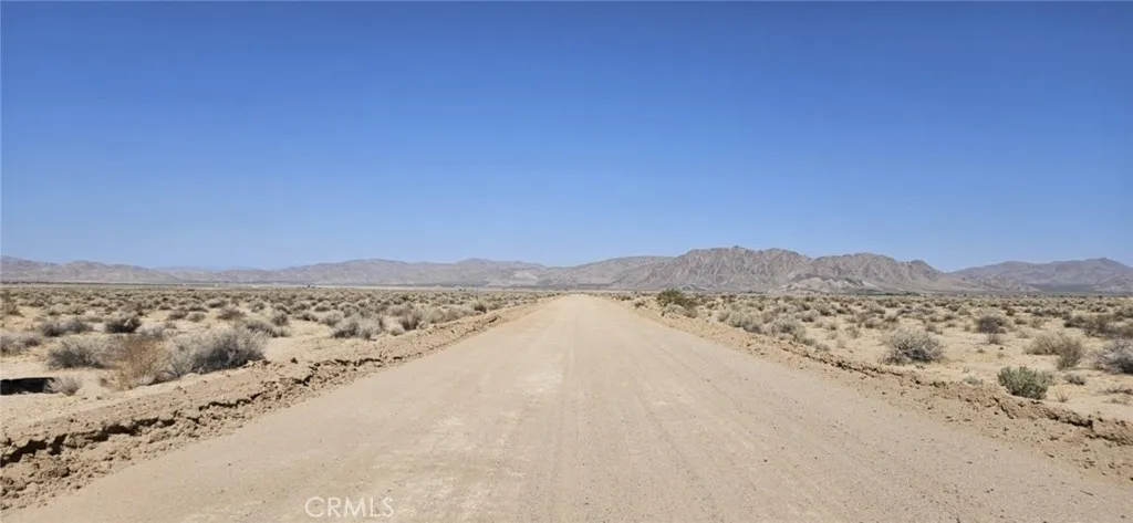 800 Smoke Bush Road Lucerne Valley, CA 92356 - Photo 3 of 3 a view of an ocean beach and mountain