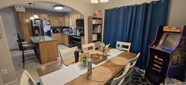 a view of a dining room with furniture
