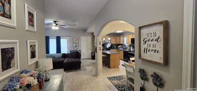 a view of a livingroom with furniture and a fireplace