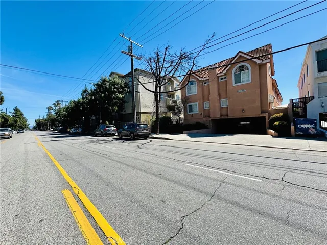 a view of a building with a street