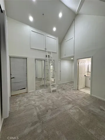 a stove top oven sitting inside of a kitchen
