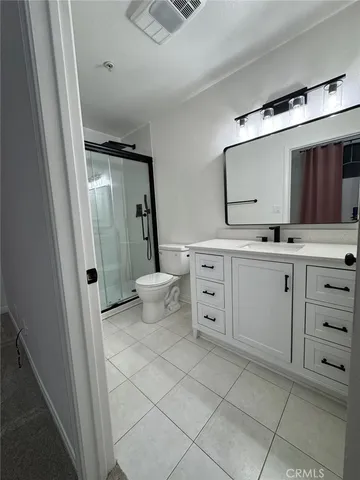 a kitchen that has a cabinets and a stove top oven