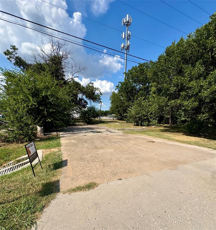 313 East 4th Street Justin, TX 76247 - Photo 2 of 4 a view of a yard with a slide