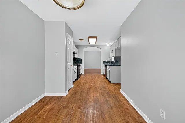 a view of room with hallway