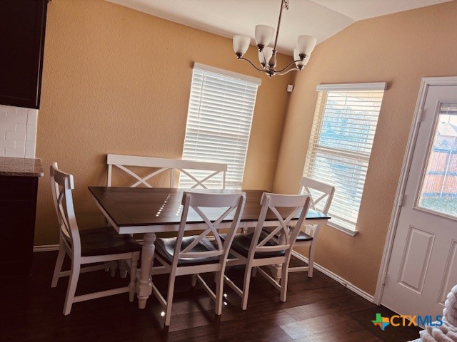 2303 Pintail Loop Copperas Cove, TX 76522 - Photo 2 of 16 a view of a dining room with furniture and wooden floor