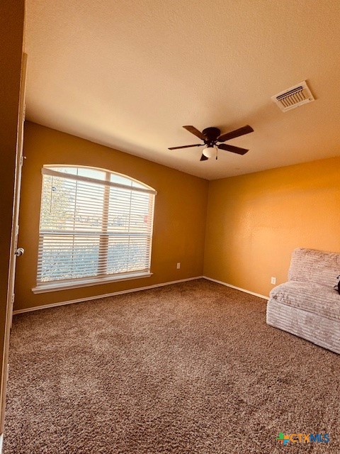 2303 Pintail Loop Copperas Cove, TX 76522 - Photo 6 of 16 a view of a livingroom with a ceiling fan and window