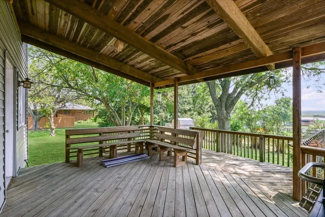 a front view of house with a garden