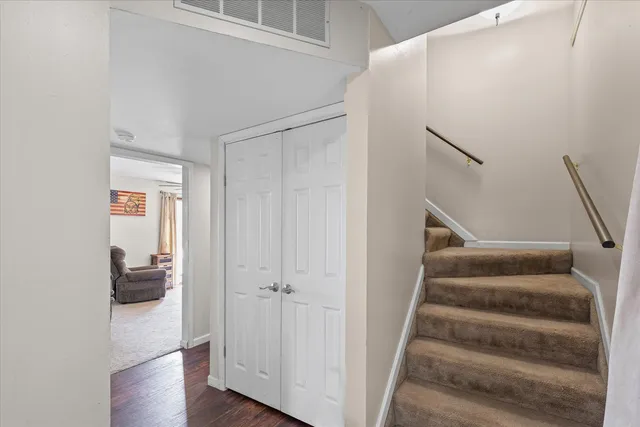 a view of entryway with wooden floor