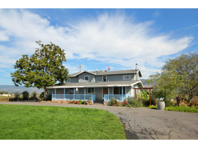 561 Lakeview Road Watsonville, CA 95076 - Photo 1 of 21 a front view of a house with a garden