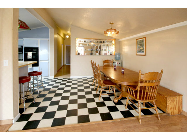561 Lakeview Road Watsonville, CA 95076 - Photo 4 of 21 a black and white checkered floor with a black white checkered floor