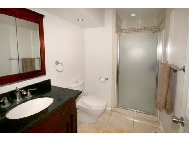 561 Lakeview Road Watsonville, CA 95076 - Photo 10 of 21 a bathroom with a sink and a mirror