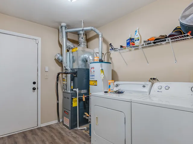 a utility room with dryer and washer