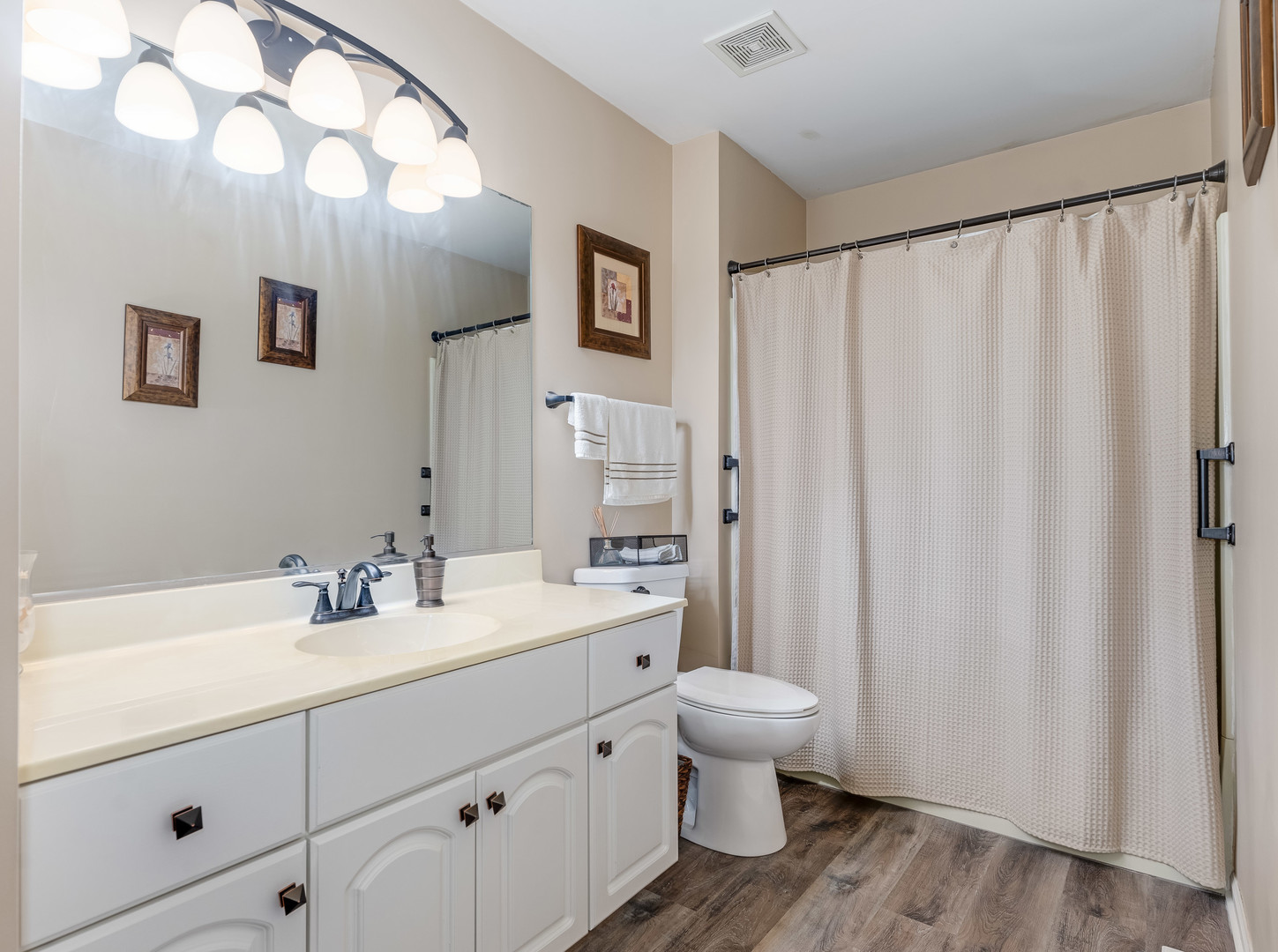 3419 Lake Side Circle Joliet, IL 60431 - Photo 26 of 26 a bathroom with a double vanity sink toilet and a mirror