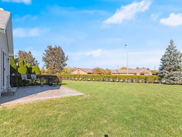 a view of swimming pool and outdoor seating
