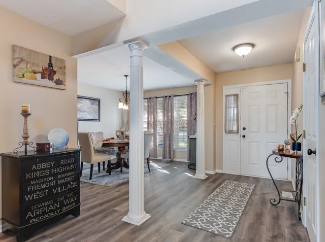 a view of a livingroom with furniture and window