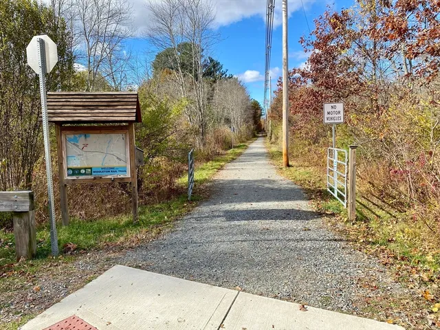 a view of pathway along with yard