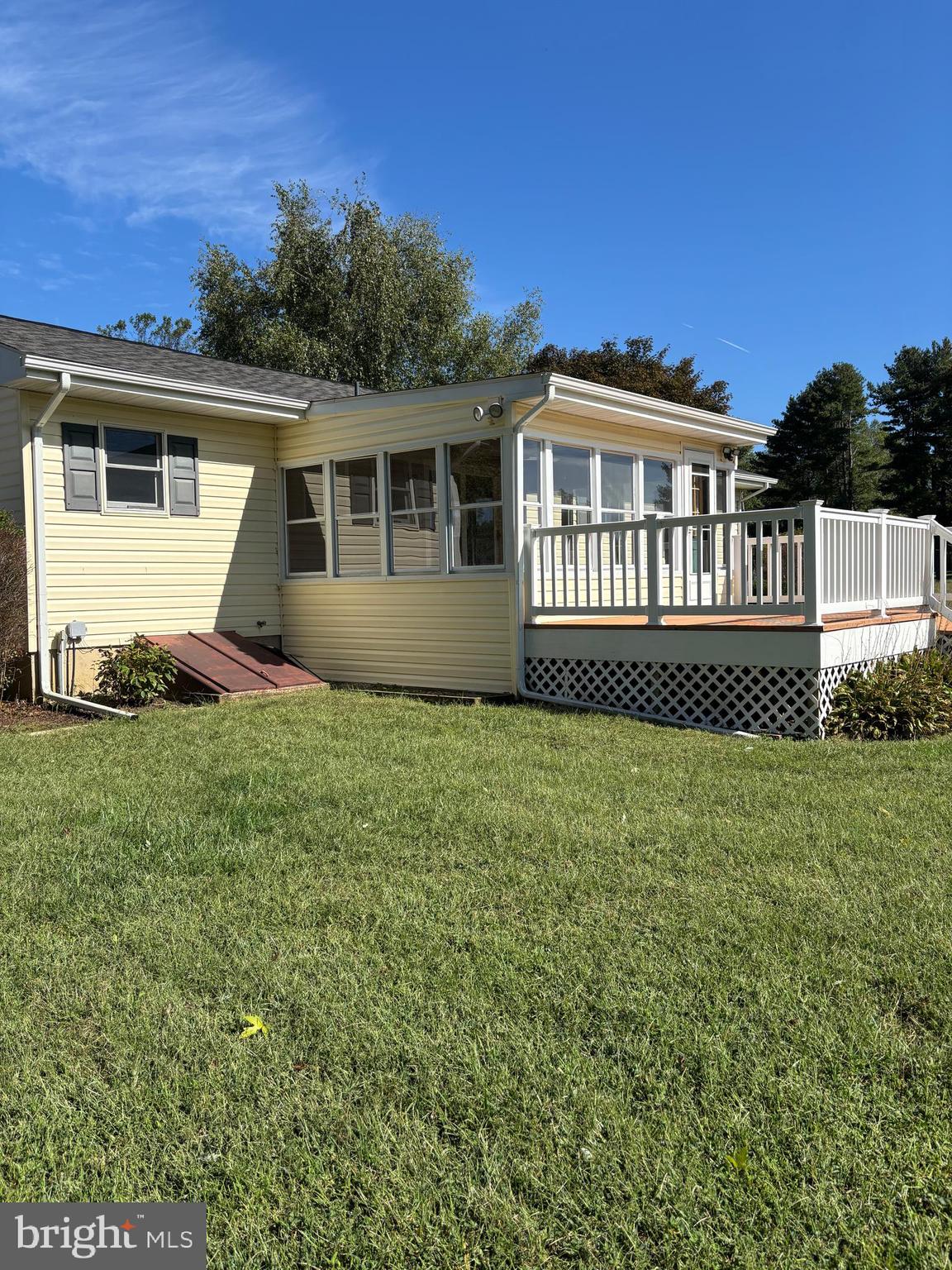 1072 Calvert Road Rising Sun, MD 21911 - Photo 3 of 17 a front view of a house with a garden