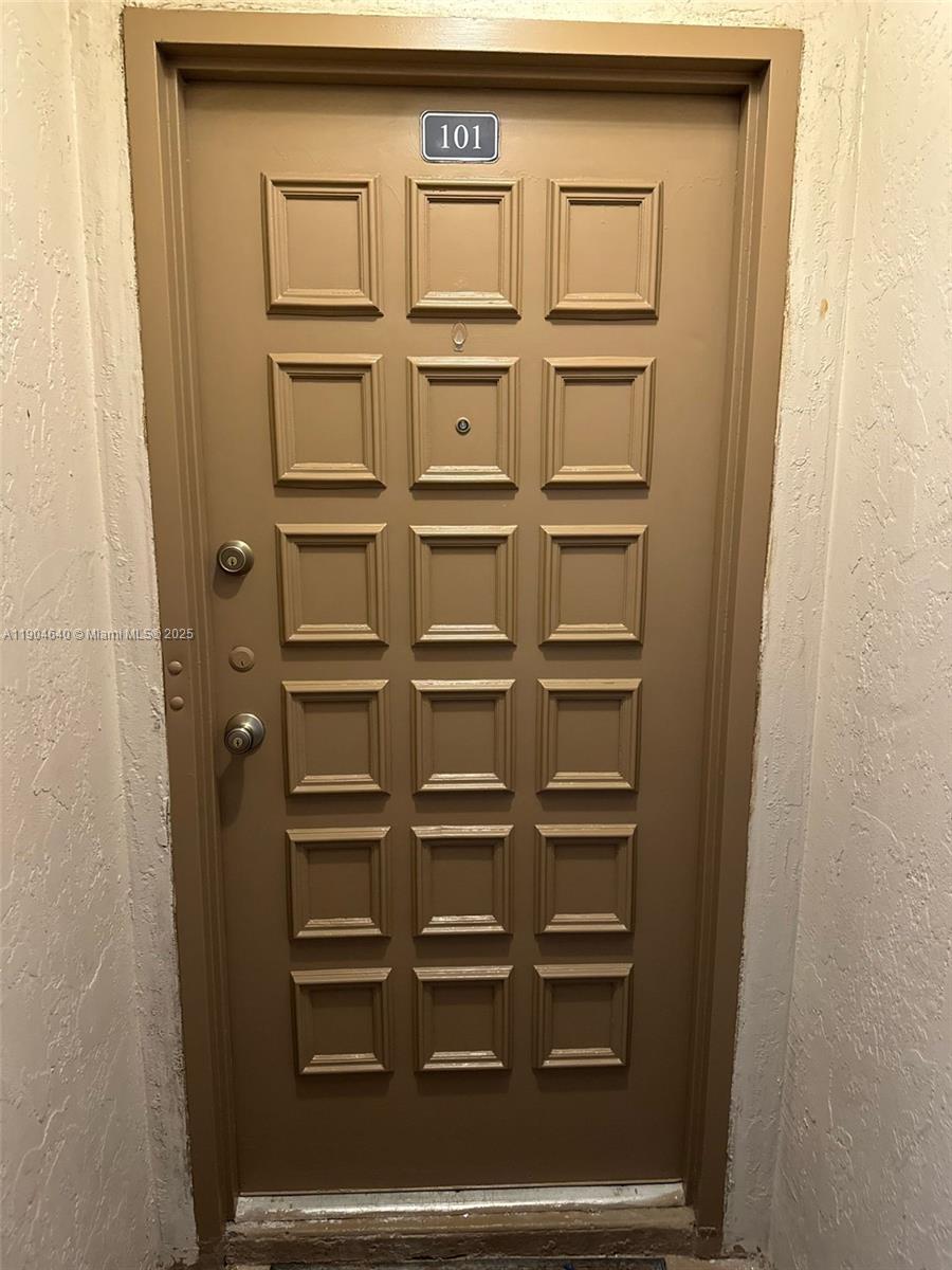 7707 Southwest 86th Street, Unit B101 Miami, FL 33143 - Photo 12 of 12 a view of a closet