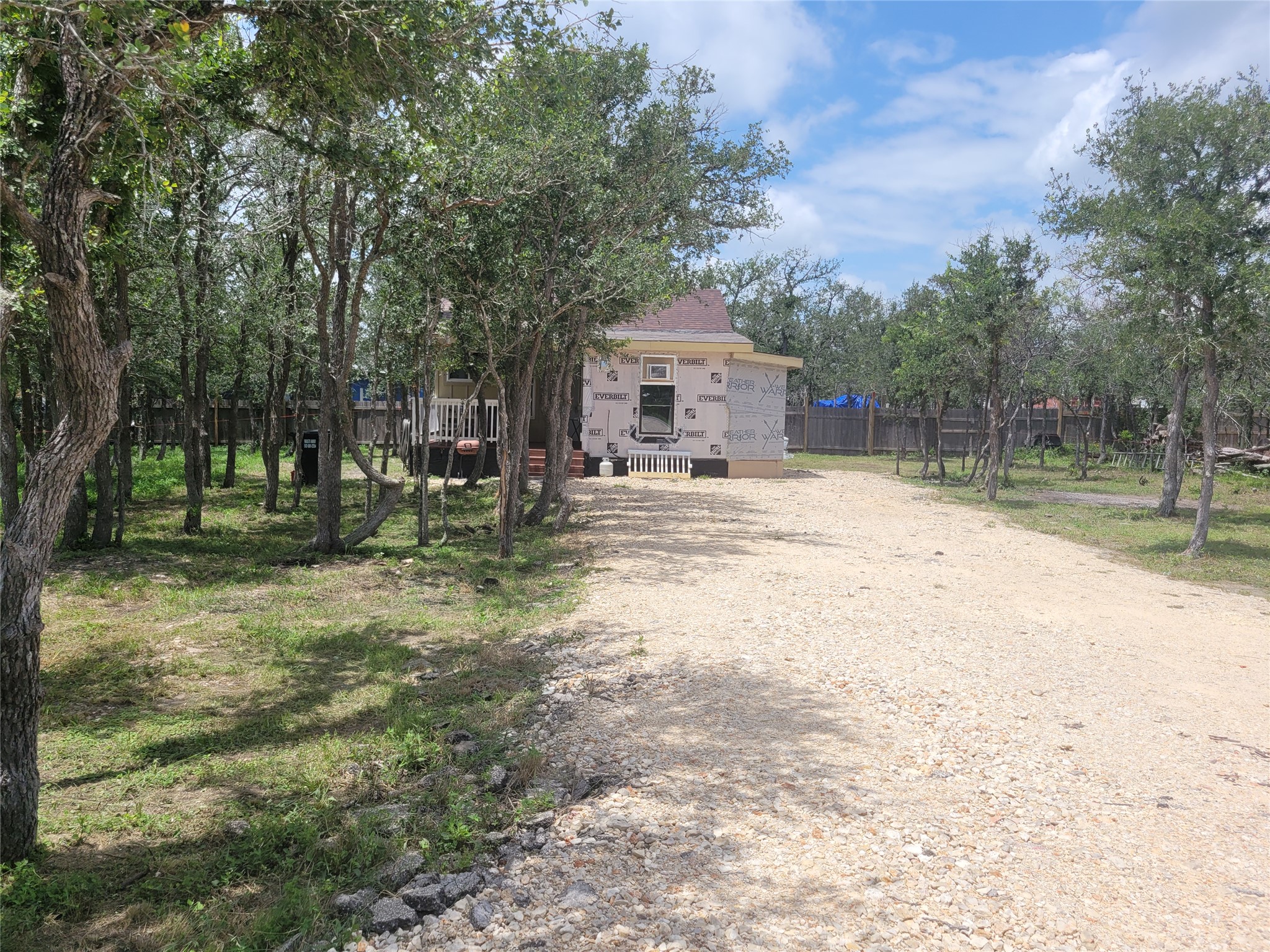 233 St Mary's Road Dale, TX 78616 - Photo 3 of 25 a house with trees in front of it