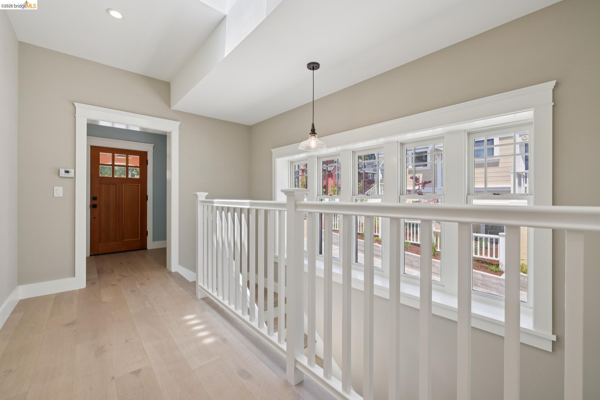 4430 Howe Street Oakland, CA 94611 - Photo 32 of 58 a view of a livingroom with an entryway and a window