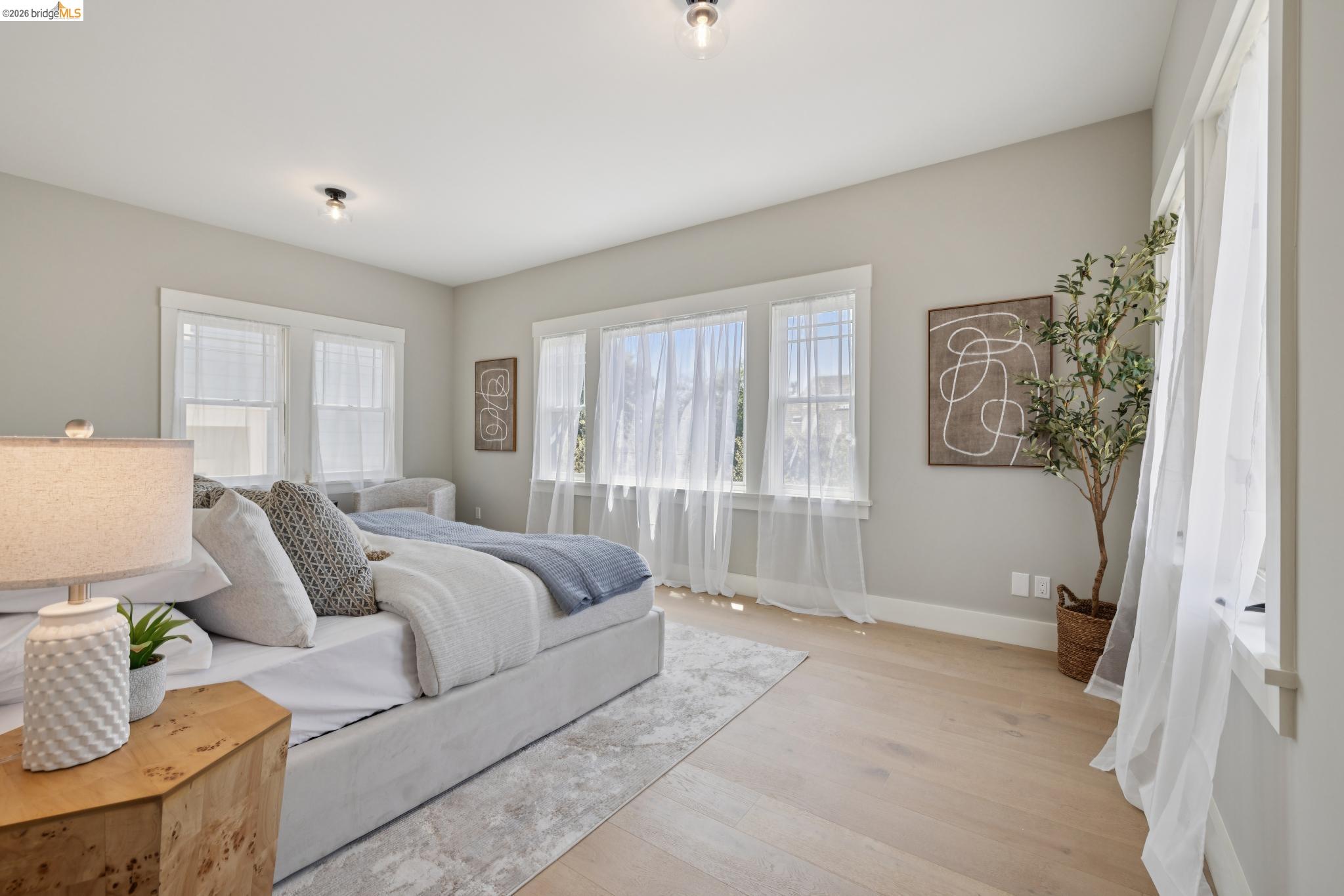 4430 Howe Street Oakland, CA 94611 - Photo 33 of 58 a living room with furniture and a large window
