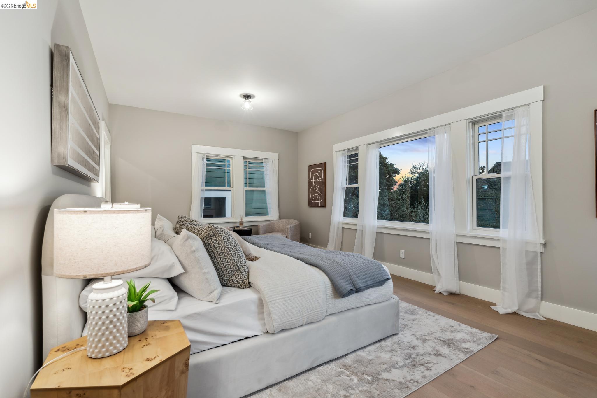 4430 Howe Street Oakland, CA 94611 - Photo 34 of 58 a living room with furniture and a window