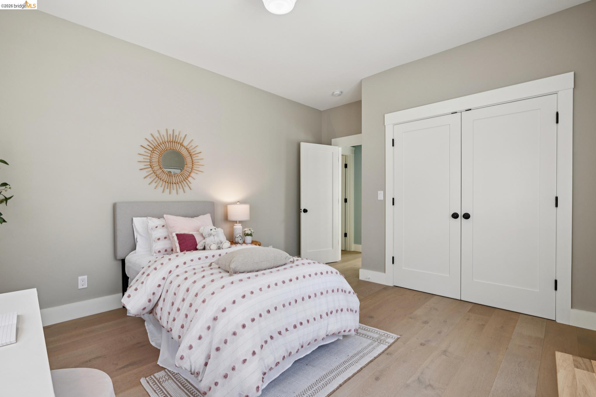 4430 Howe Street Oakland, CA 94611 - Photo 46 of 58 a bedroom with a bed and a window