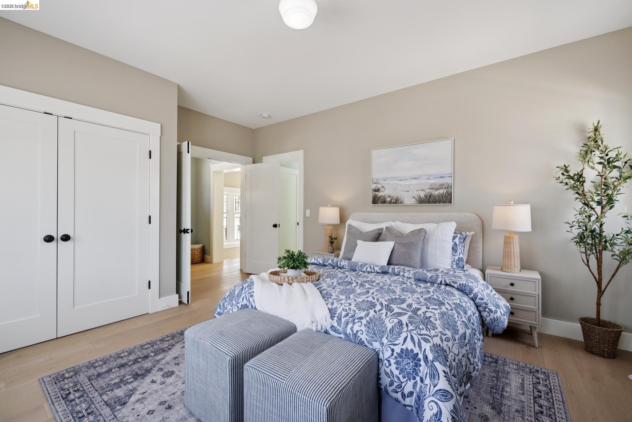 4430 Howe Street Oakland, CA 94611 - Photo 51 of 58 a bedroom with a bed and a couch