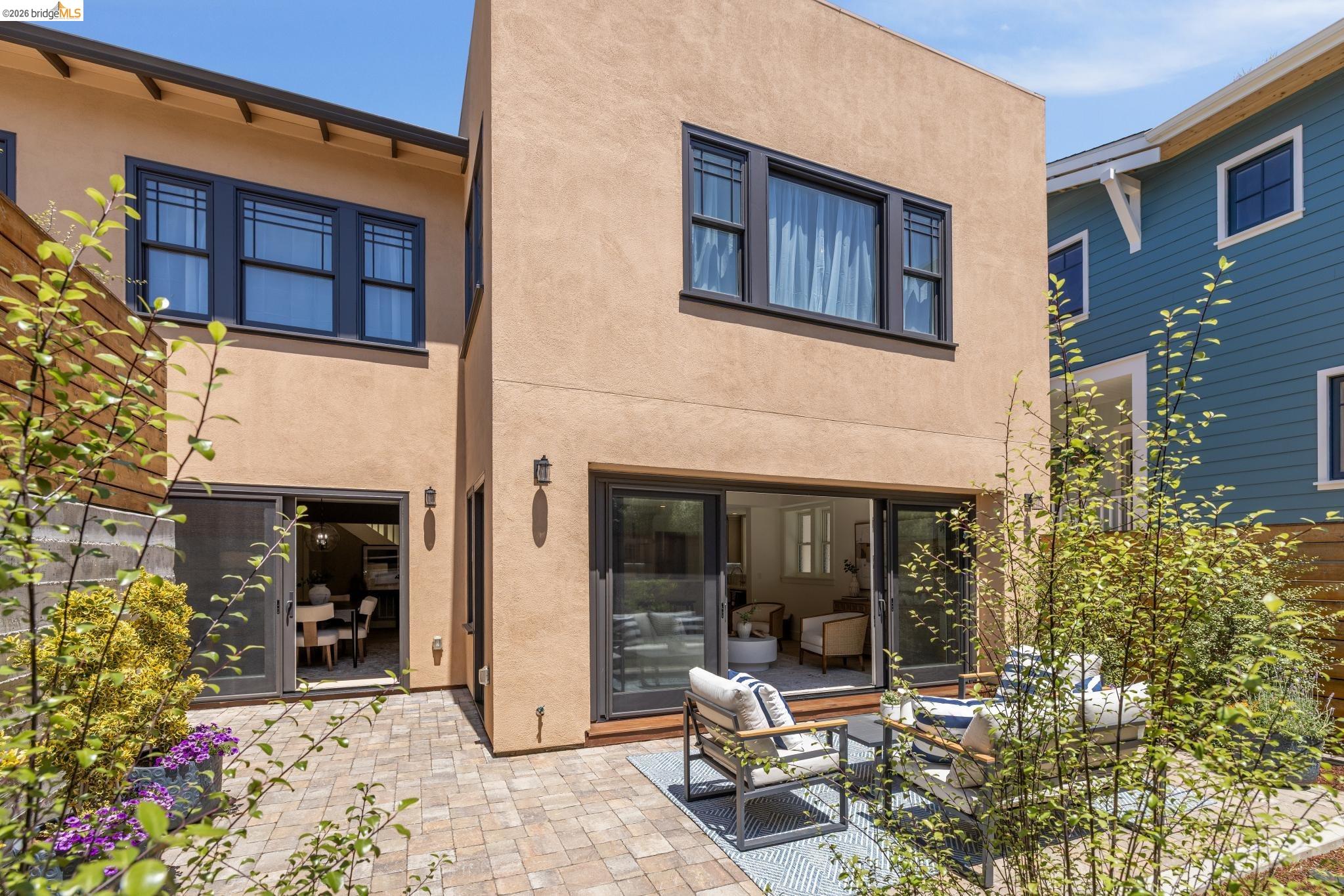 4430 Howe Street Oakland, CA 94611 - Photo 54 of 58 a building outdoor space with patio furniture and potted plants