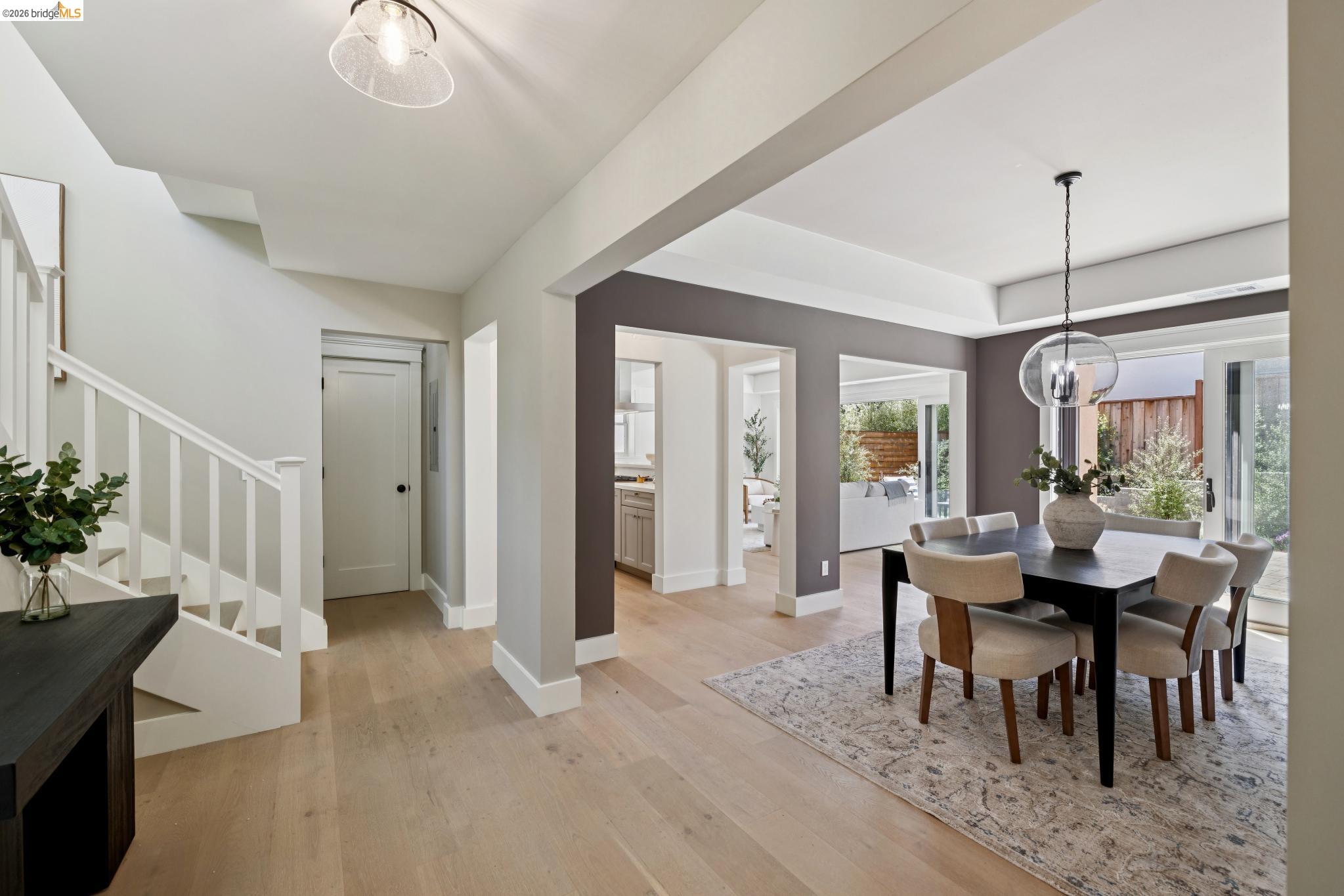 4430 Howe Street Oakland, CA 94611 - Photo 6 of 58 a view of a dining room with furniture window and wooden floor